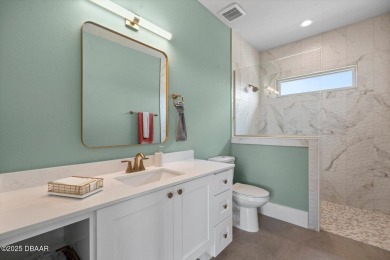 This stunning Hulbert Homes model in Veranda Bay isn't just on Ocean Palm Golf Course in Florida - for sale on GolfHomes.com, golf home, golf lot