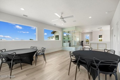 This stunning Hulbert Homes model in Veranda Bay isn't just on Ocean Palm Golf Course in Florida - for sale on GolfHomes.com, golf home, golf lot