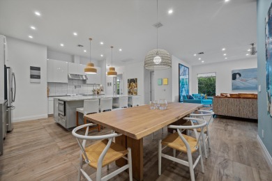 A house with modern finishes and amazing vintage decor combines on Palm Beach Polo and Country Club in Florida - for sale on GolfHomes.com, golf home, golf lot