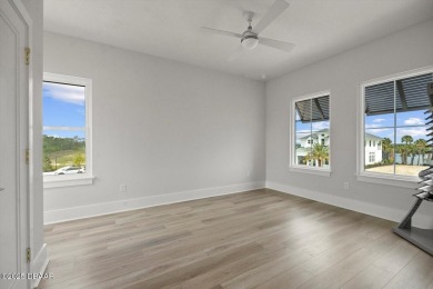 This stunning Hulbert Homes model in Veranda Bay isn't just on Ocean Palm Golf Course in Florida - for sale on GolfHomes.com, golf home, golf lot
