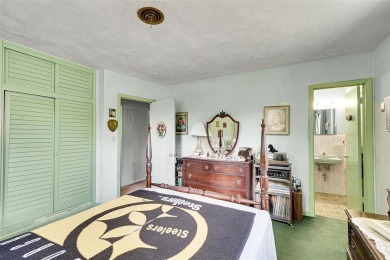 This charming 3-bedroom, 2-bathroom home offers the perfect on Fort Lauderdale Country Club in Florida - for sale on GolfHomes.com, golf home, golf lot