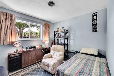 This charming 3-bedroom, 2-bathroom home offers the perfect on Fort Lauderdale Country Club in Florida - for sale on GolfHomes.com, golf home, golf lot