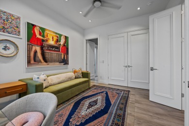 A house with modern finishes and amazing vintage decor combines on Palm Beach Polo and Country Club in Florida - for sale on GolfHomes.com, golf home, golf lot