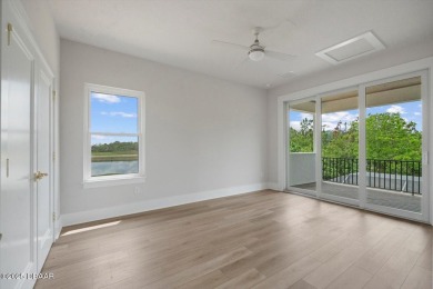 This stunning Hulbert Homes model in Veranda Bay isn't just on Ocean Palm Golf Course in Florida - for sale on GolfHomes.com, golf home, golf lot