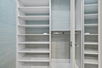 A house with modern finishes and amazing vintage decor combines on Palm Beach Polo and Country Club in Florida - for sale on GolfHomes.com, golf home, golf lot