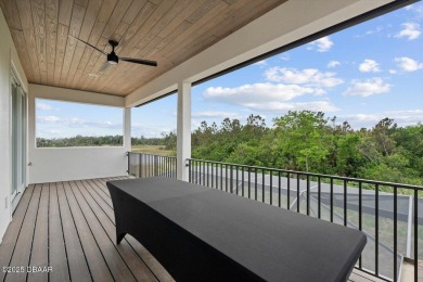 This stunning Hulbert Homes model in Veranda Bay isn't just on Ocean Palm Golf Course in Florida - for sale on GolfHomes.com, golf home, golf lot