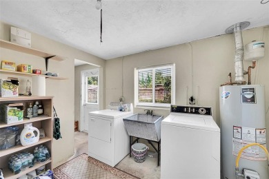 This charming 3-bedroom, 2-bathroom home offers the perfect on Fort Lauderdale Country Club in Florida - for sale on GolfHomes.com, golf home, golf lot