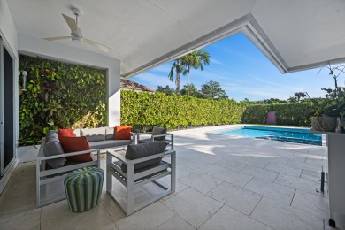 A house with modern finishes and amazing vintage decor combines on Palm Beach Polo and Country Club in Florida - for sale on GolfHomes.com, golf home, golf lot