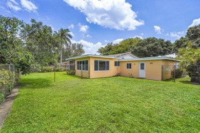 This charming 3-bedroom, 2-bathroom home offers the perfect on Fort Lauderdale Country Club in Florida - for sale on GolfHomes.com, golf home, golf lot
