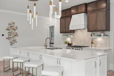 This stunning Hulbert Homes model in Veranda Bay isn't just on Ocean Palm Golf Course in Florida - for sale on GolfHomes.com, golf home, golf lot