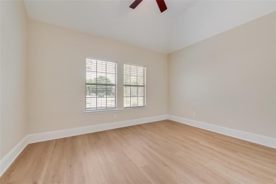 Live luxuriously on the 8th fairway in coveted Firewheel on Firewheel Golf Park in Texas - for sale on GolfHomes.com, golf home, golf lot