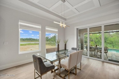 This stunning Hulbert Homes model in Veranda Bay isn't just on Ocean Palm Golf Course in Florida - for sale on GolfHomes.com, golf home, golf lot