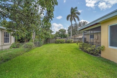 This charming 3-bedroom, 2-bathroom home offers the perfect on Fort Lauderdale Country Club in Florida - for sale on GolfHomes.com, golf home, golf lot
