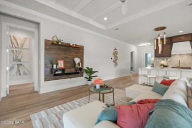 This stunning Hulbert Homes model in Veranda Bay isn't just on Ocean Palm Golf Course in Florida - for sale on GolfHomes.com, golf home, golf lot