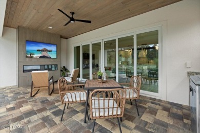 This stunning Hulbert Homes model in Veranda Bay isn't just on Ocean Palm Golf Course in Florida - for sale on GolfHomes.com, golf home, golf lot