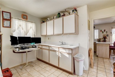 This popular Silverton model needs a lot of TLC.  The home is on Highland Falls Golf Club in Nevada - for sale on GolfHomes.com, golf home, golf lot