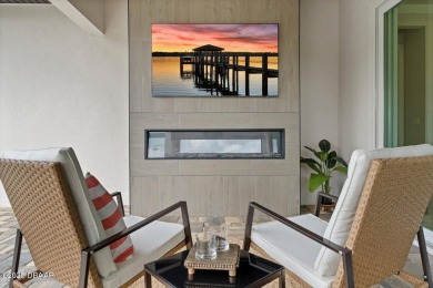 This stunning Hulbert Homes model in Veranda Bay isn't just on Ocean Palm Golf Course in Florida - for sale on GolfHomes.com, golf home, golf lot