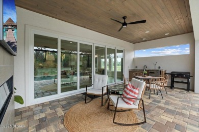 This stunning Hulbert Homes model in Veranda Bay isn't just on Ocean Palm Golf Course in Florida - for sale on GolfHomes.com, golf home, golf lot