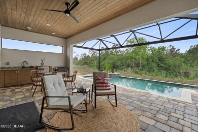 This stunning Hulbert Homes model in Veranda Bay isn't just on Ocean Palm Golf Course in Florida - for sale on GolfHomes.com, golf home, golf lot