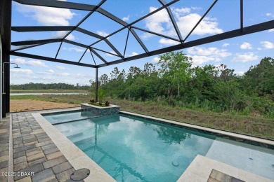 This stunning Hulbert Homes model in Veranda Bay isn't just on Ocean Palm Golf Course in Florida - for sale on GolfHomes.com, golf home, golf lot