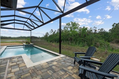 This stunning Hulbert Homes model in Veranda Bay isn't just on Ocean Palm Golf Course in Florida - for sale on GolfHomes.com, golf home, golf lot