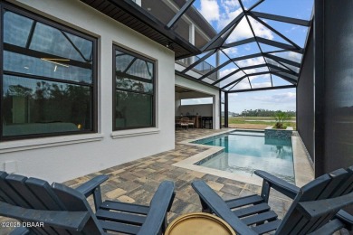 This stunning Hulbert Homes model in Veranda Bay isn't just on Ocean Palm Golf Course in Florida - for sale on GolfHomes.com, golf home, golf lot