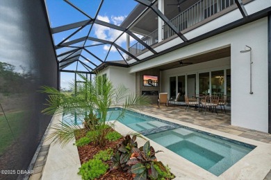 This stunning Hulbert Homes model in Veranda Bay isn't just on Ocean Palm Golf Course in Florida - for sale on GolfHomes.com, golf home, golf lot