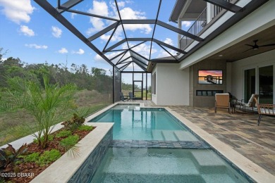 This stunning Hulbert Homes model in Veranda Bay isn't just on Ocean Palm Golf Course in Florida - for sale on GolfHomes.com, golf home, golf lot