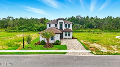 This stunning Hulbert Homes model in Veranda Bay isn't just on Ocean Palm Golf Course in Florida - for sale on GolfHomes.com, golf home, golf lot