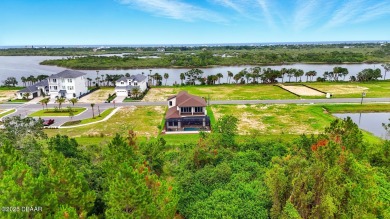 This stunning Hulbert Homes model in Veranda Bay isn't just on Ocean Palm Golf Course in Florida - for sale on GolfHomes.com, golf home, golf lot