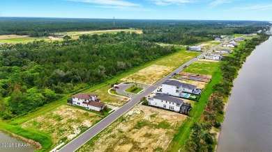 This stunning Hulbert Homes model in Veranda Bay isn't just on Ocean Palm Golf Course in Florida - for sale on GolfHomes.com, golf home, golf lot