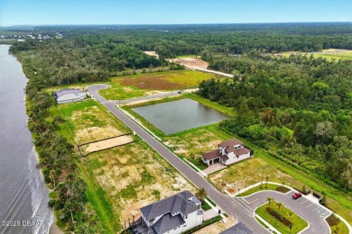 This stunning Hulbert Homes model in Veranda Bay isn't just on Ocean Palm Golf Course in Florida - for sale on GolfHomes.com, golf home, golf lot
