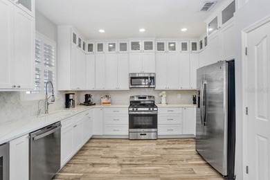 Discover an updated and affordable home in the heart of highly on Westchase Golf Club in Florida - for sale on GolfHomes.com, golf home, golf lot