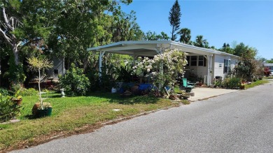 TWO BEDROOM, 1 1/2 BATHROOM MOBILE HOME IN ACTIVE 55+ COMMUNITY on River Run Golf Links in Florida - for sale on GolfHomes.com, golf home, golf lot