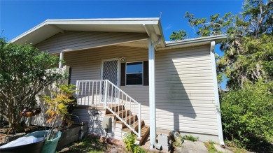 TWO BEDROOM, 1 1/2 BATHROOM MOBILE HOME IN ACTIVE 55+ COMMUNITY on River Run Golf Links in Florida - for sale on GolfHomes.com, golf home, golf lot