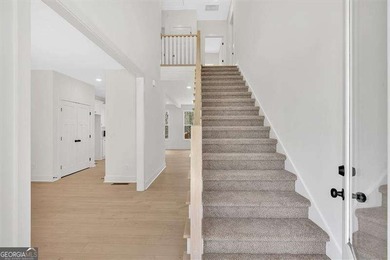 This beautiful two-story home on a full unfinished basement is on The Plantation Golf Club in Georgia - for sale on GolfHomes.com, golf home, golf lot