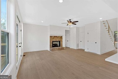 This beautiful two-story home on a full unfinished basement is on The Plantation Golf Club in Georgia - for sale on GolfHomes.com, golf home, golf lot