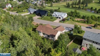 This well-maintained 4-bedroom, 3-bath home, built in 2013 on Virginia Golf Course in Minnesota - for sale on GolfHomes.com, golf home, golf lot