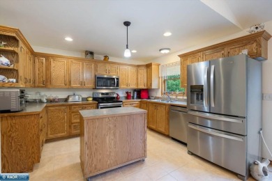 This well-maintained 4-bedroom, 3-bath home, built in 2013 on Virginia Golf Course in Minnesota - for sale on GolfHomes.com, golf home, golf lot