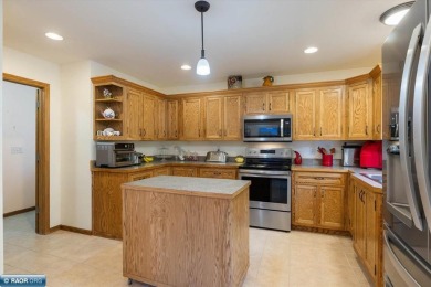 This well-maintained 4-bedroom, 3-bath home, built in 2013 on Virginia Golf Course in Minnesota - for sale on GolfHomes.com, golf home, golf lot
