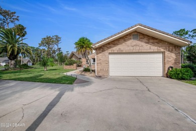 Welcome to this stunning, high-and-dry, custom-built brick home on The Club At Pelican Bay - North Course in Florida - for sale on GolfHomes.com, golf home, golf lot