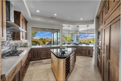 Stunning views and walls of glass bring the red rocks and on Entrada at Snow Canyon in Utah - for sale on GolfHomes.com, golf home, golf lot