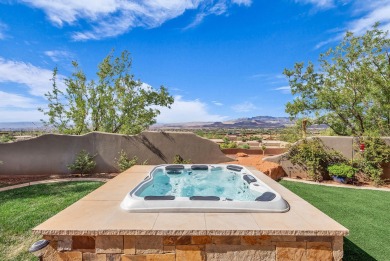 Stunning views and walls of glass bring the red rocks and on Entrada at Snow Canyon in Utah - for sale on GolfHomes.com, golf home, golf lot