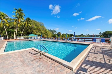 Located in the desirable Pine Island Ridge / Live Oak community on Pine Island Ridge Country Club in Florida - for sale on GolfHomes.com, golf home, golf lot