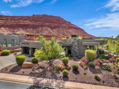 Stunning views and walls of glass bring the red rocks and on Entrada at Snow Canyon in Utah - for sale on GolfHomes.com, golf home, golf lot