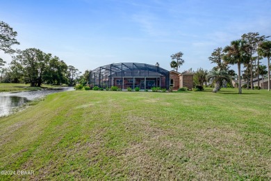 Welcome to this stunning, high-and-dry, custom-built brick home on The Club At Pelican Bay - North Course in Florida - for sale on GolfHomes.com, golf home, golf lot