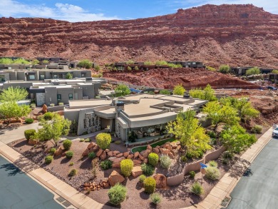 Stunning views and walls of glass bring the red rocks and on Entrada at Snow Canyon in Utah - for sale on GolfHomes.com, golf home, golf lot