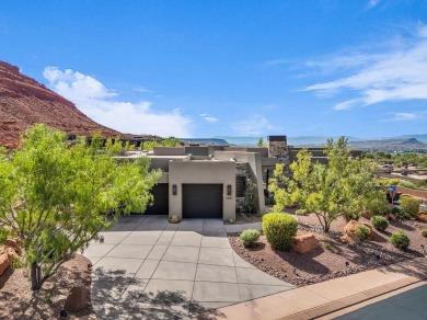 Stunning views and walls of glass bring the red rocks and on Entrada at Snow Canyon in Utah - for sale on GolfHomes.com, golf home, golf lot