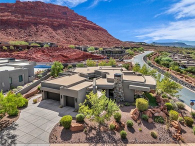 Stunning views and walls of glass bring the red rocks and on Entrada at Snow Canyon in Utah - for sale on GolfHomes.com, golf home, golf lot