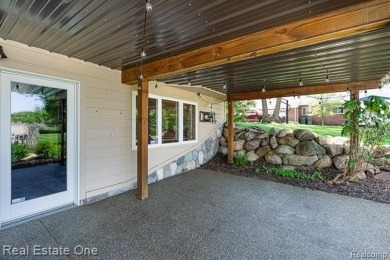Looking for a house that offers AMAZING VIEWS, Outdoor adventure on Indianwood Golf and Country Club in Michigan - for sale on GolfHomes.com, golf home, golf lot